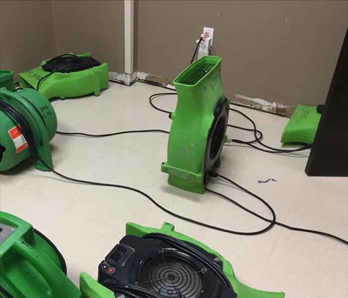SERVPRO equipment placed to help dry water damage in business